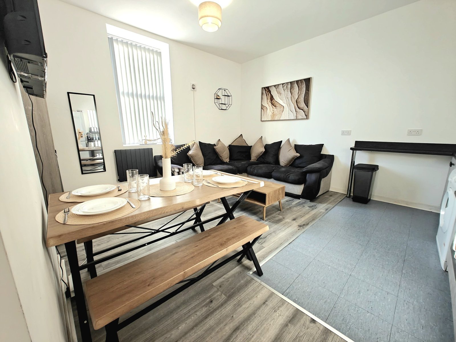 Living and dining room at Turf Apartments in Bury